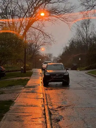 Rainy roads and fiery reflections.